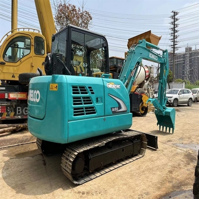Excavadora Kobelco SK60 em excelente estado para construção de tubulações